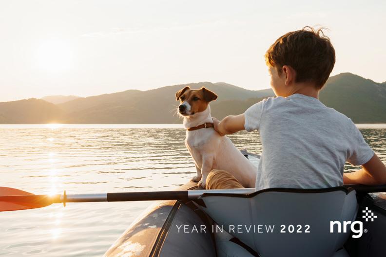 Child with dog in a kayak