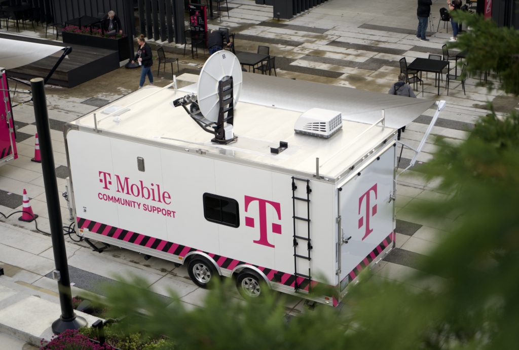 trailer with satellite dish and tmobile logo