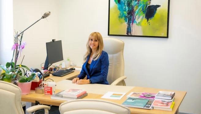 Nicoletta Luppi sitting at a desk