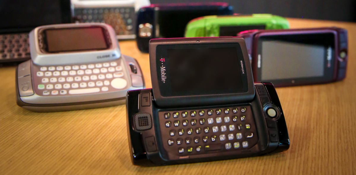 Flip phones arranged on a desk