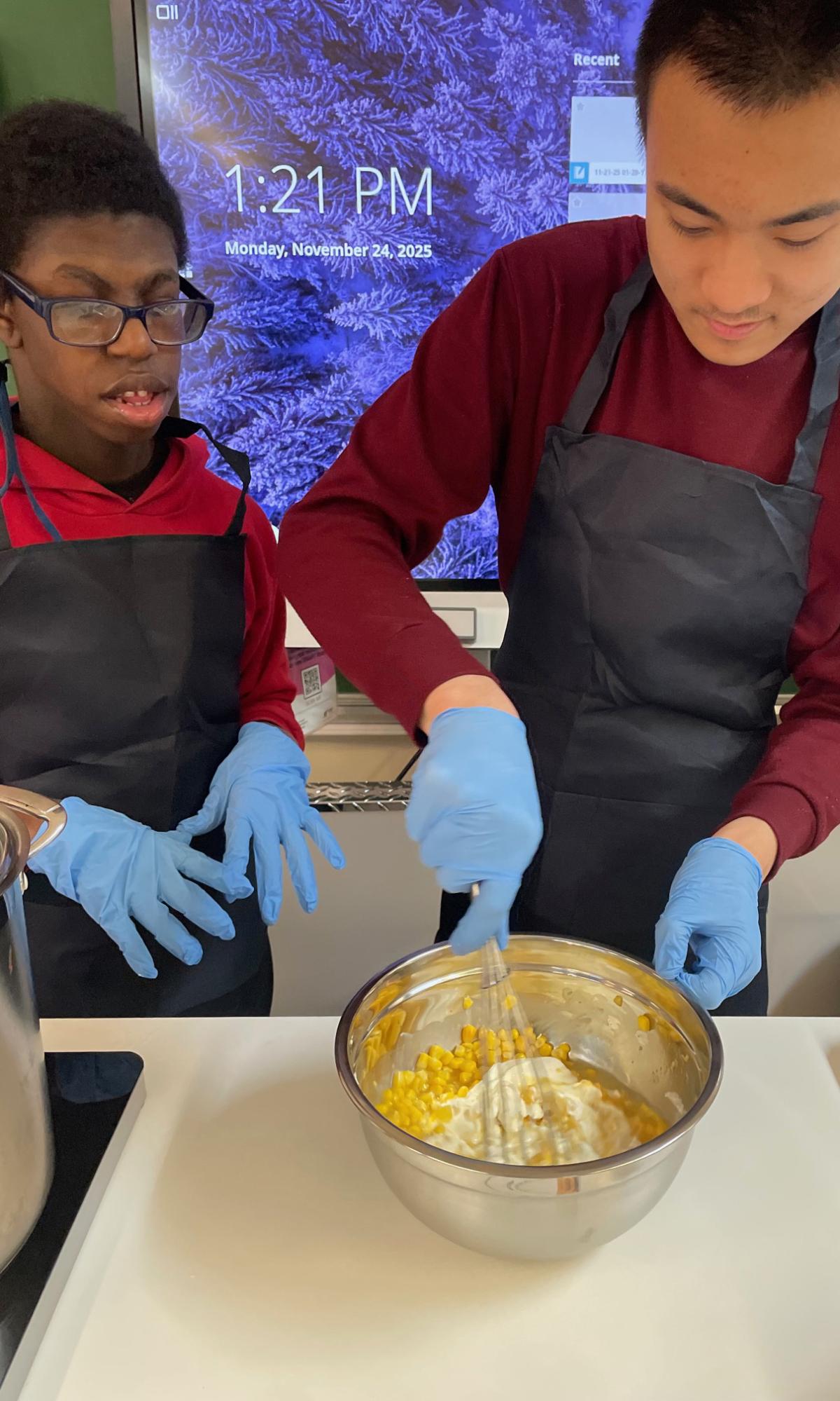 people working in a kitchen