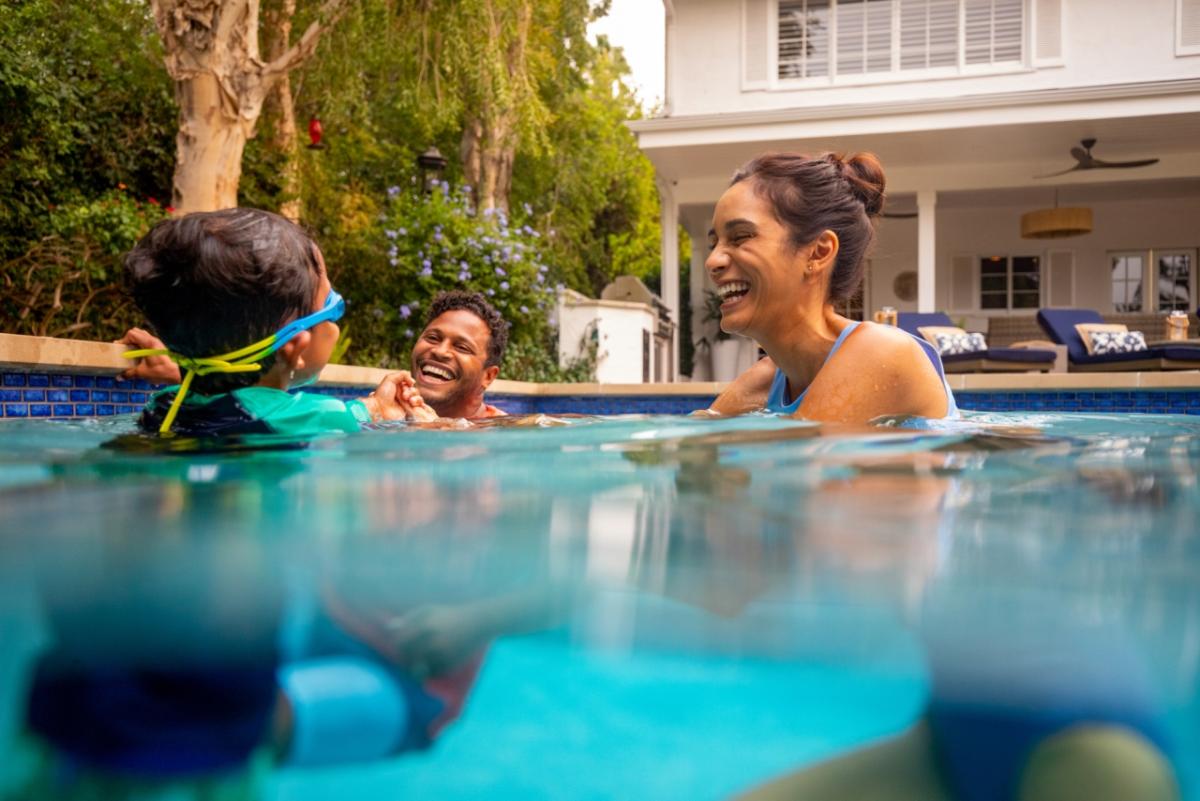 people swimming in a pool