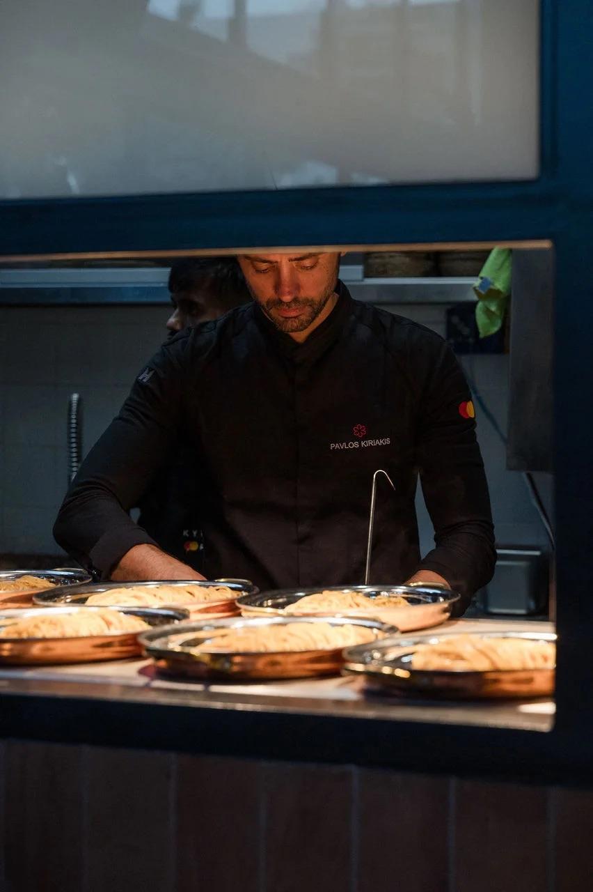 person preparing food at restaurant