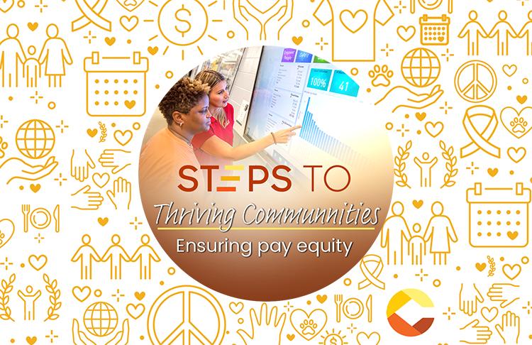 "Steps to thriving communities ensuring pay equity" over a photo of two people pointing to a large digital screen with graphs.