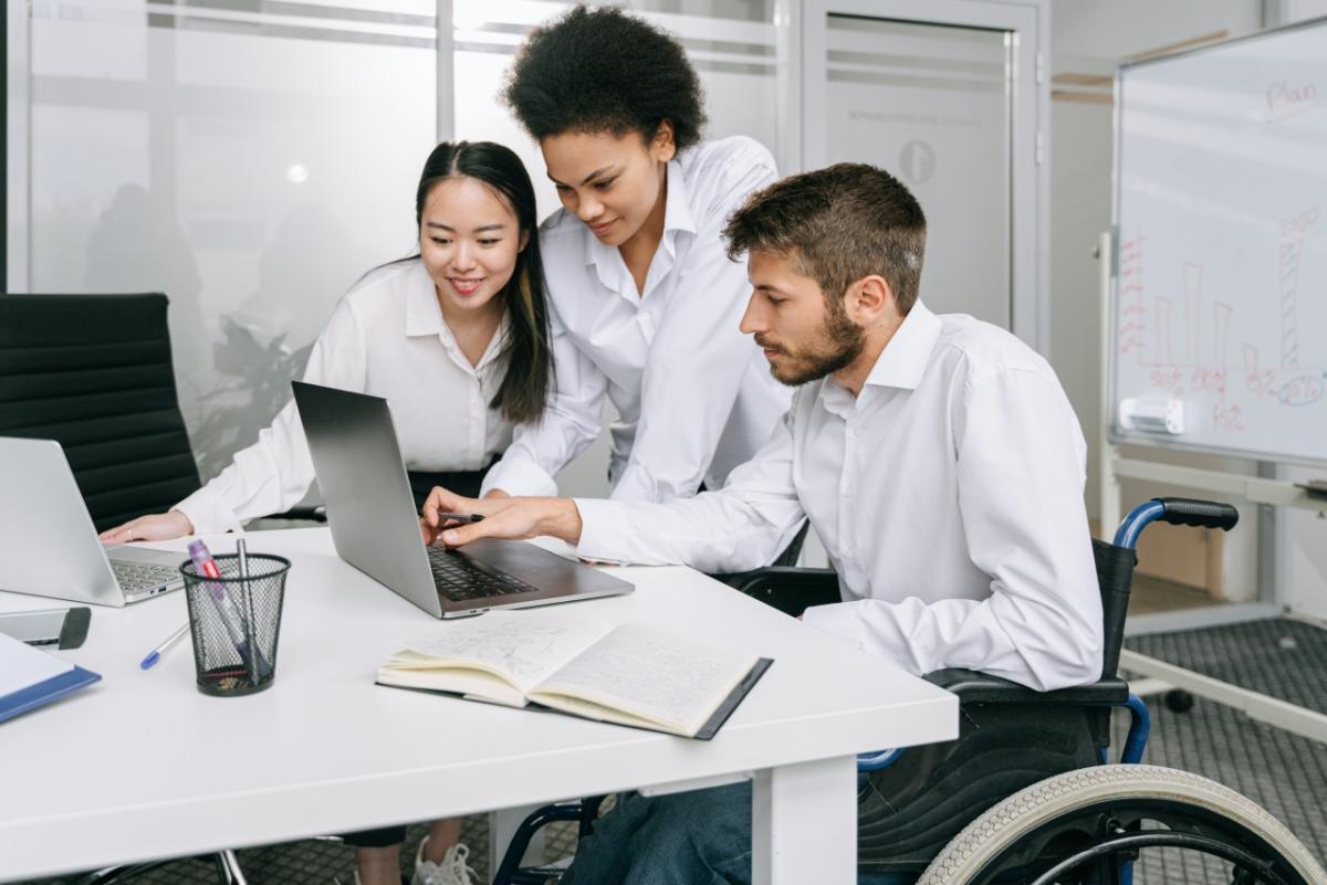 coworkers at a computer