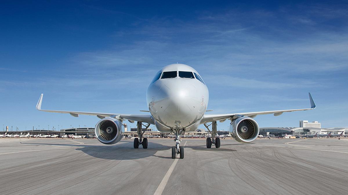 An airplane on a runway.