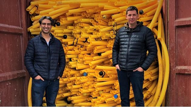 Canellos, left, and Waller with one of four bins collected in one week—totaling 25,000 pounds of pipe. Canellos, left, and Waller with one of four bins collected in one week—totaling 25,000 pounds of pipe.