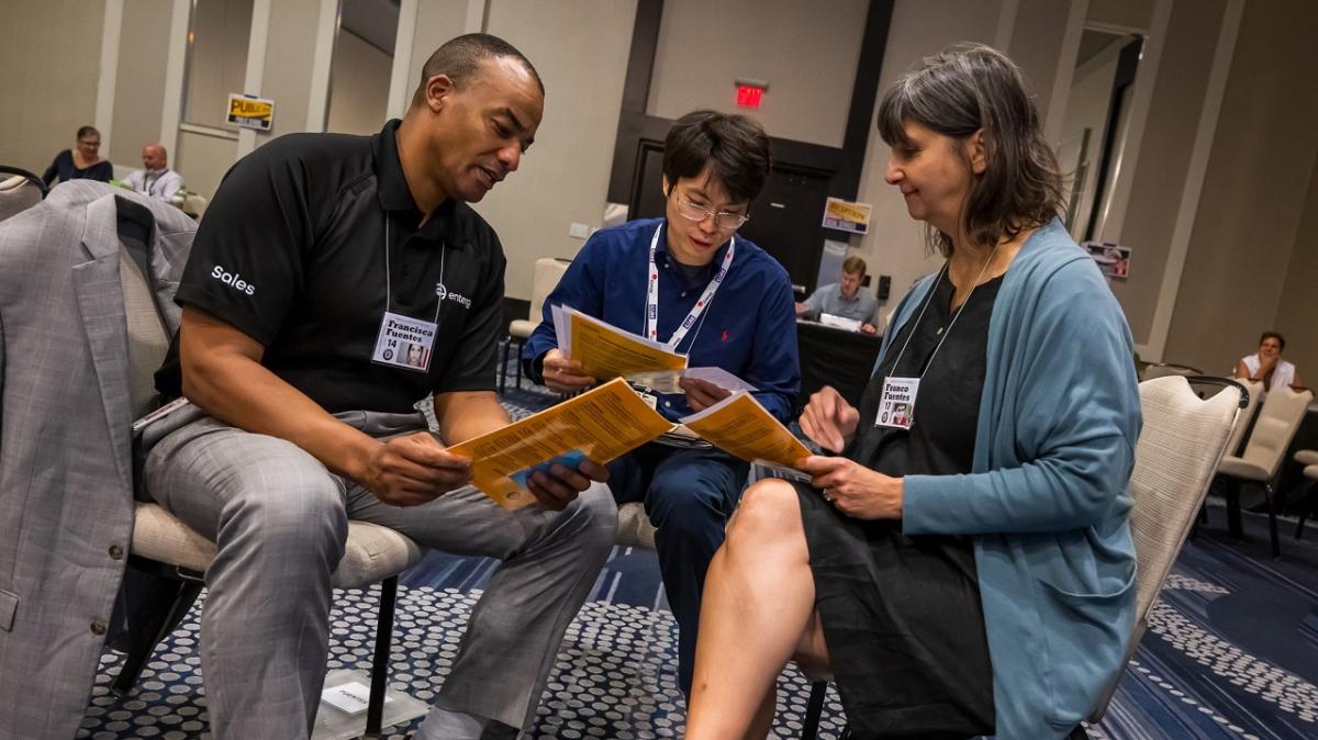 Entergy employees participating in a poverty simulation.