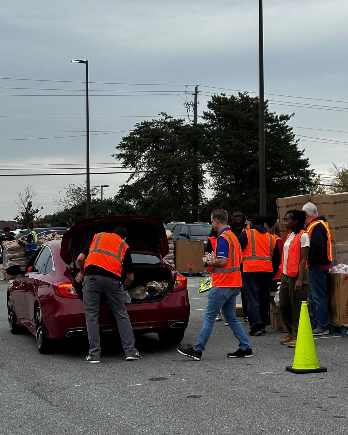 people loading up a car