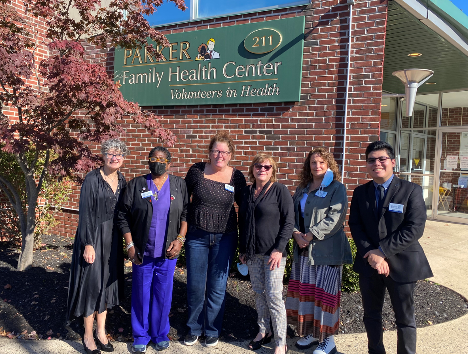 Pictured from left to right are: Suzy Dyer, Executive Director; Elinor Goddard, Phlebotomist; Maggie Clifford, Clinic Manager; Anna Taylor, Facilities Manager; Terri Villarosa, Social Worker; Steven Sanchez, Clinic Assistant, Parker Family Health Center.