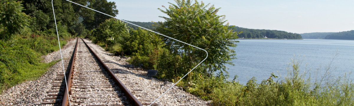 Railway track running along side the waters edge