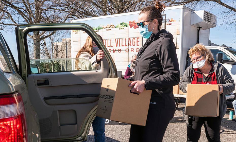 Loading boxes into cars