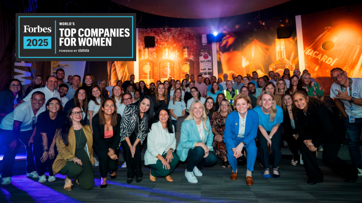 Forbes 2025 Top Companies for Women logo over a group photo