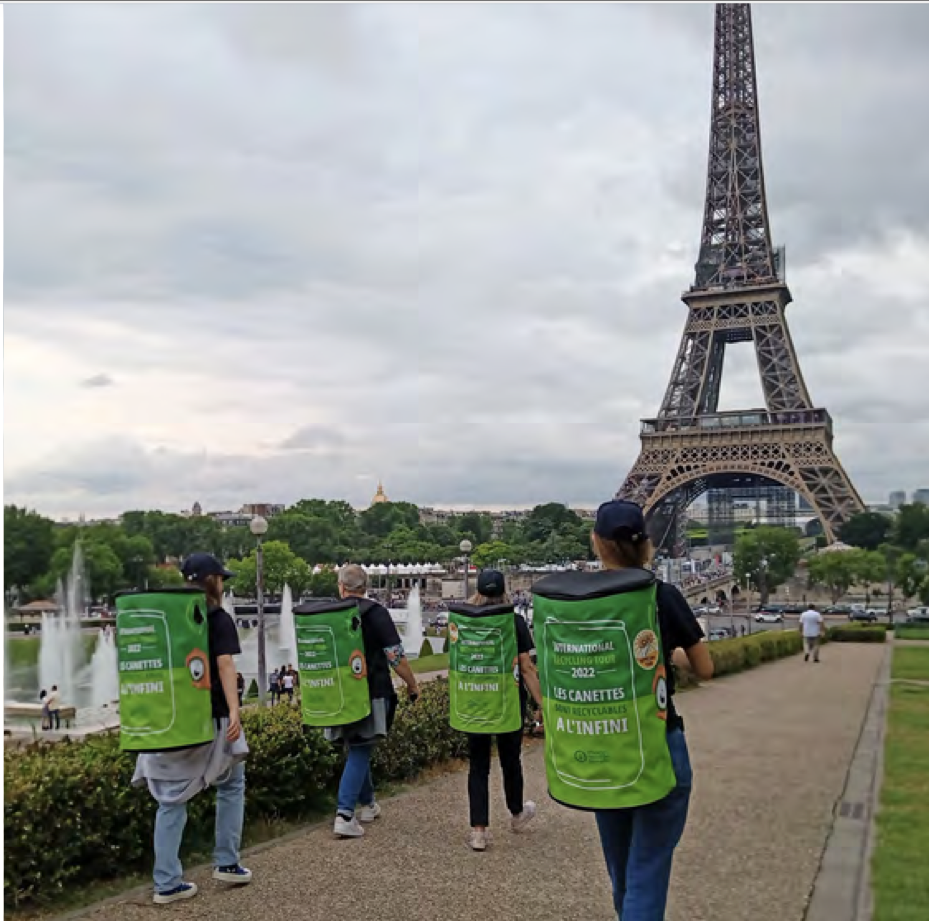 volunteers collecting cans near the Eiffel Tower
