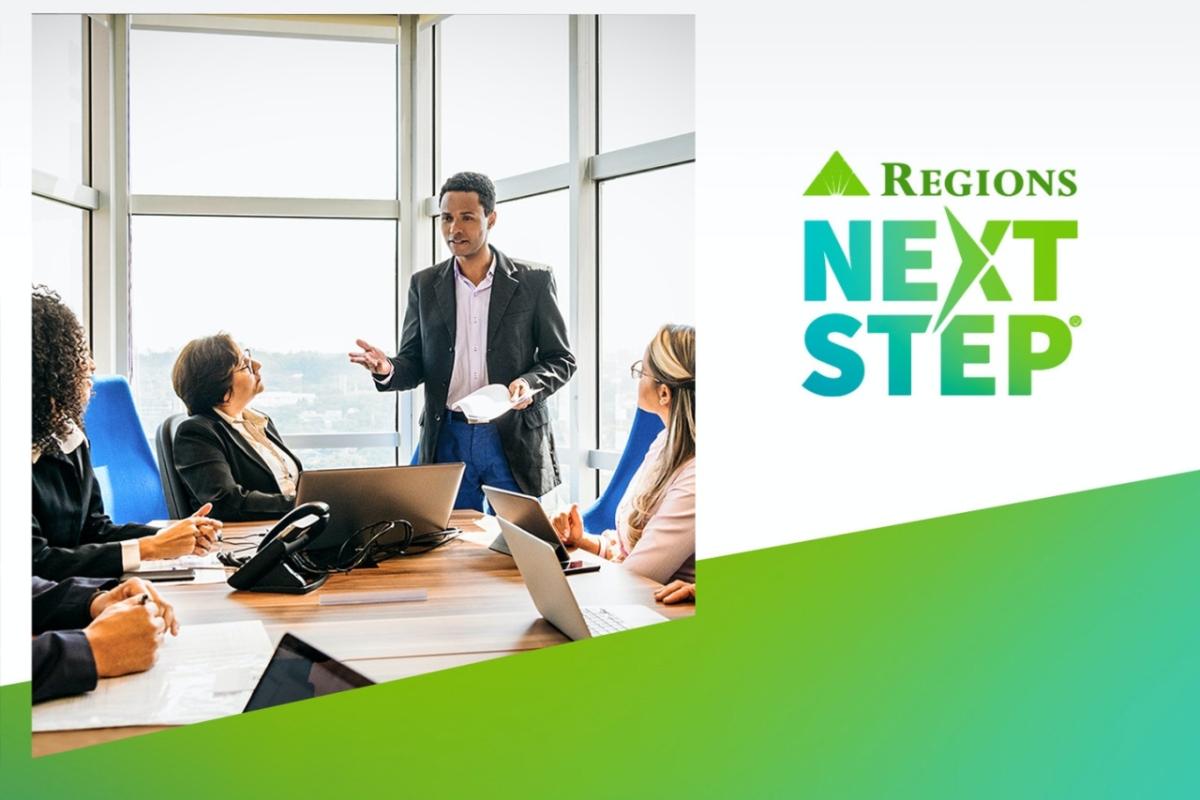 Regions "Next Step" Banner with person speaking to others around a table