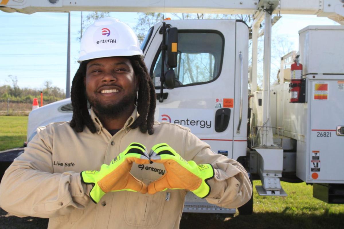 Entergy worker making a heart sign with hands