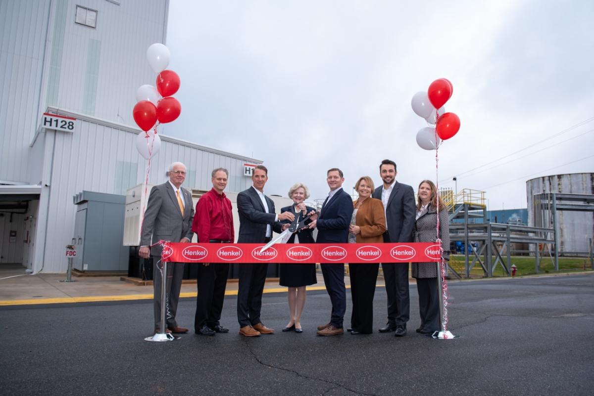 Group of people at ribbon cutting