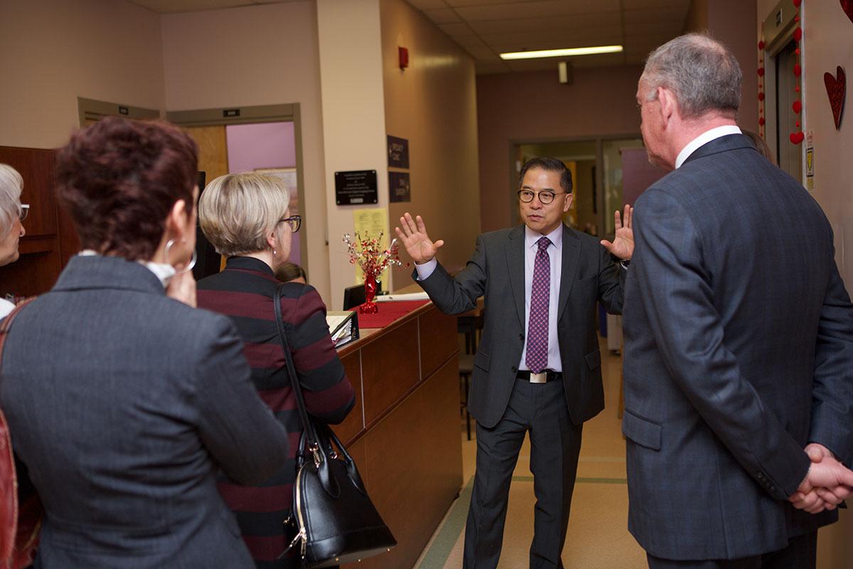 Dr. Aaron Kim, Acting Associate Dean (Clinical), Guides Representatives From Scotiabank On A Tour Of The College Of Dentistry's Patient Care Clinic On Jan. 15, 2018.