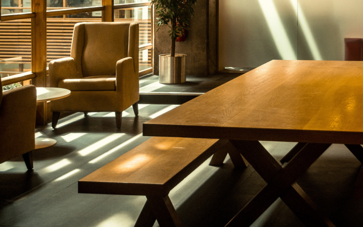 Wood table and bench in room