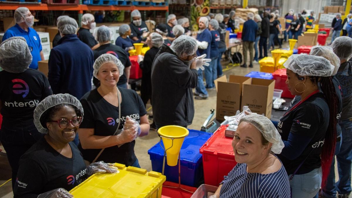 people smiling and working together