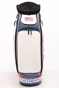 A standing golf bag with American flag on one pocket.