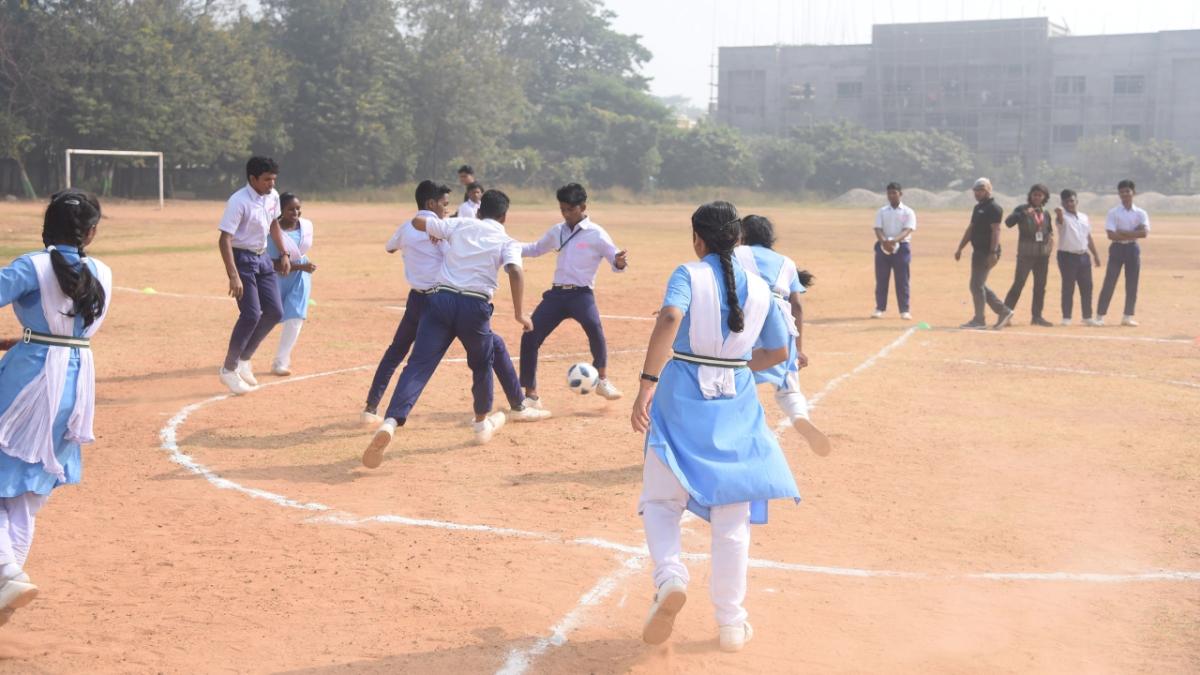 students playing soccer