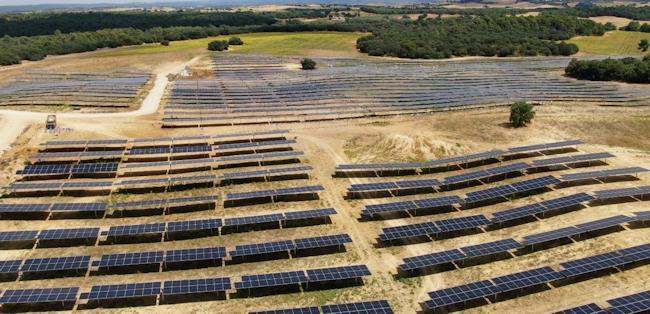 Photo from Grenergy Photovoltaic (PV) Solar Energy Project Los Escuderos as an example of a PV solar project similar to the one being built in La Cereal. Field of solar panels