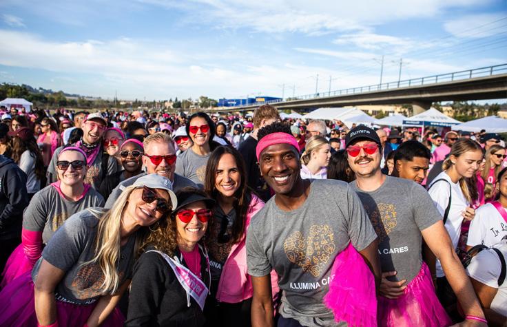 Illumina Chief Commercial Officer Everett Cunningham (center, in headband) joins the Making Strides Against Cancer walk in San Diego. Photo by Kristy Walker " "