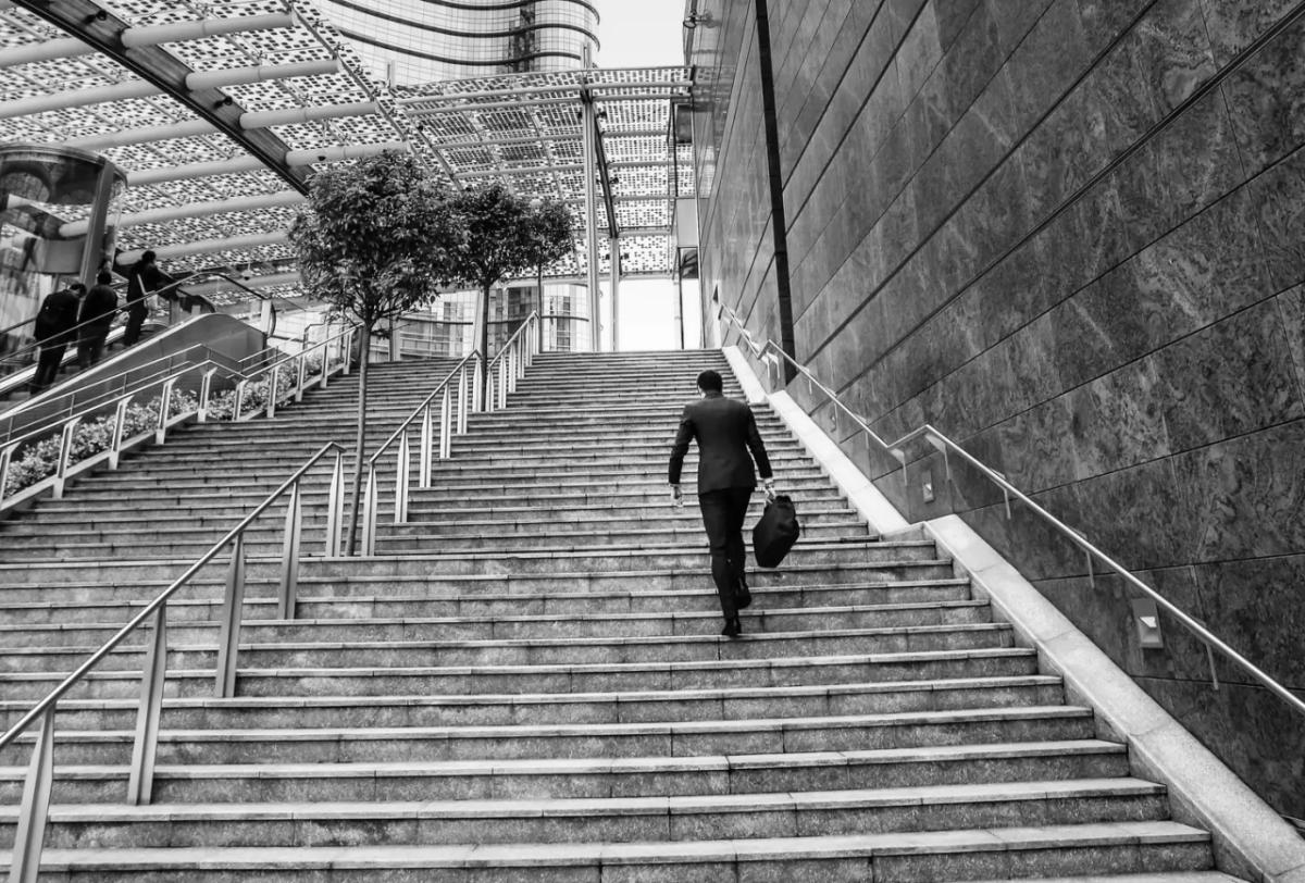 Small steps forward. Image: Mike Dotta (Shutterstock) Image courtesy of Quartz person walking up stairs