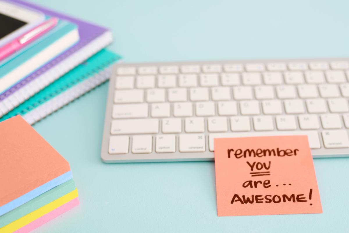 sticky note reading "remember you are... awesome!"