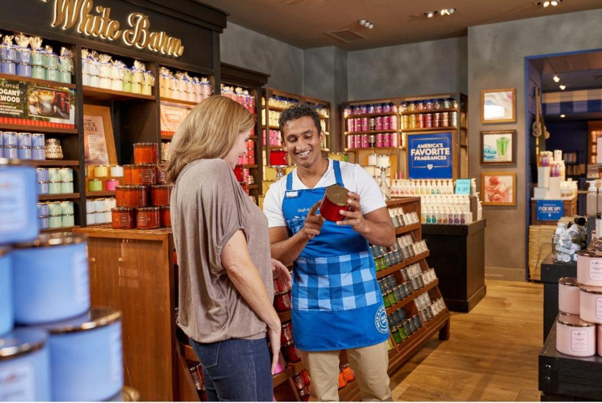 people looking at products in a Bath and Body Works store