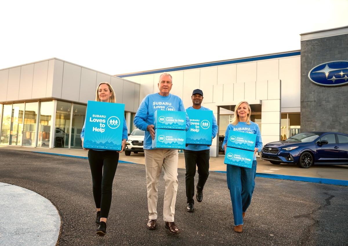people walking with boxes
