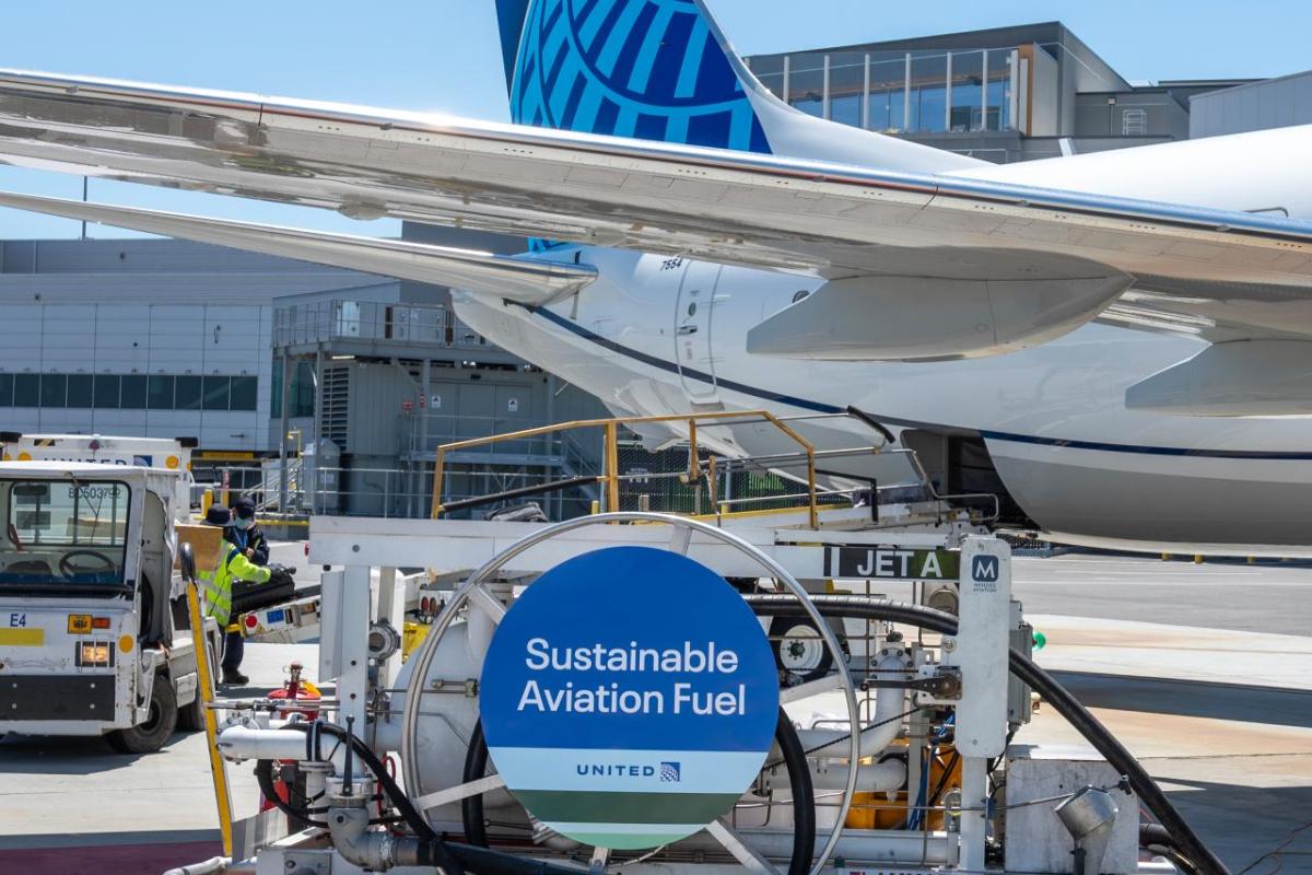 tank of sustainable aviation fuel refueling a United jet