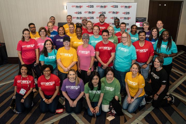 Group of people in Emerge t-shirts