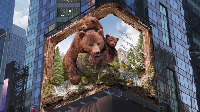 Grizzly Bear and cubs depicted on billboard