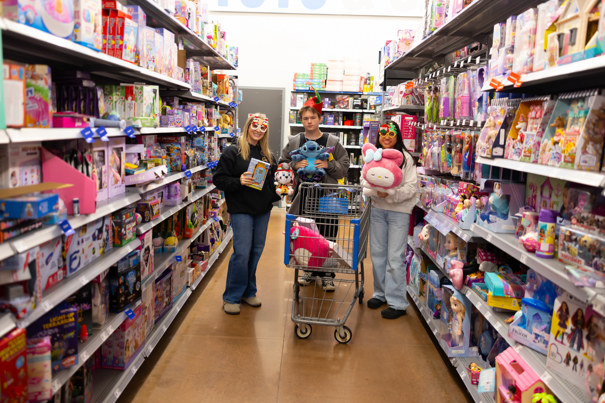 Volunteers shopping for Christmas gifts