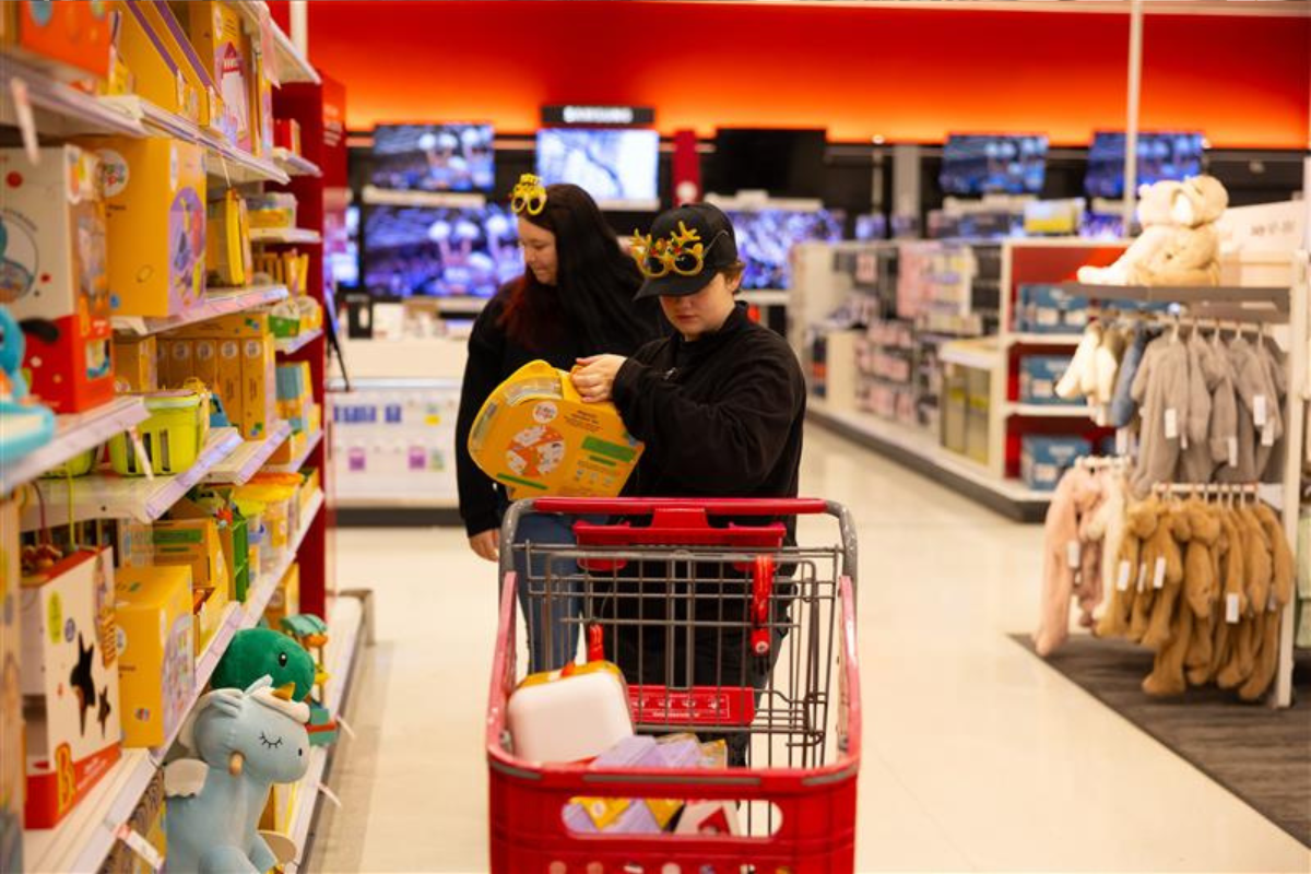 Volunteers shopping for Christmas gifts