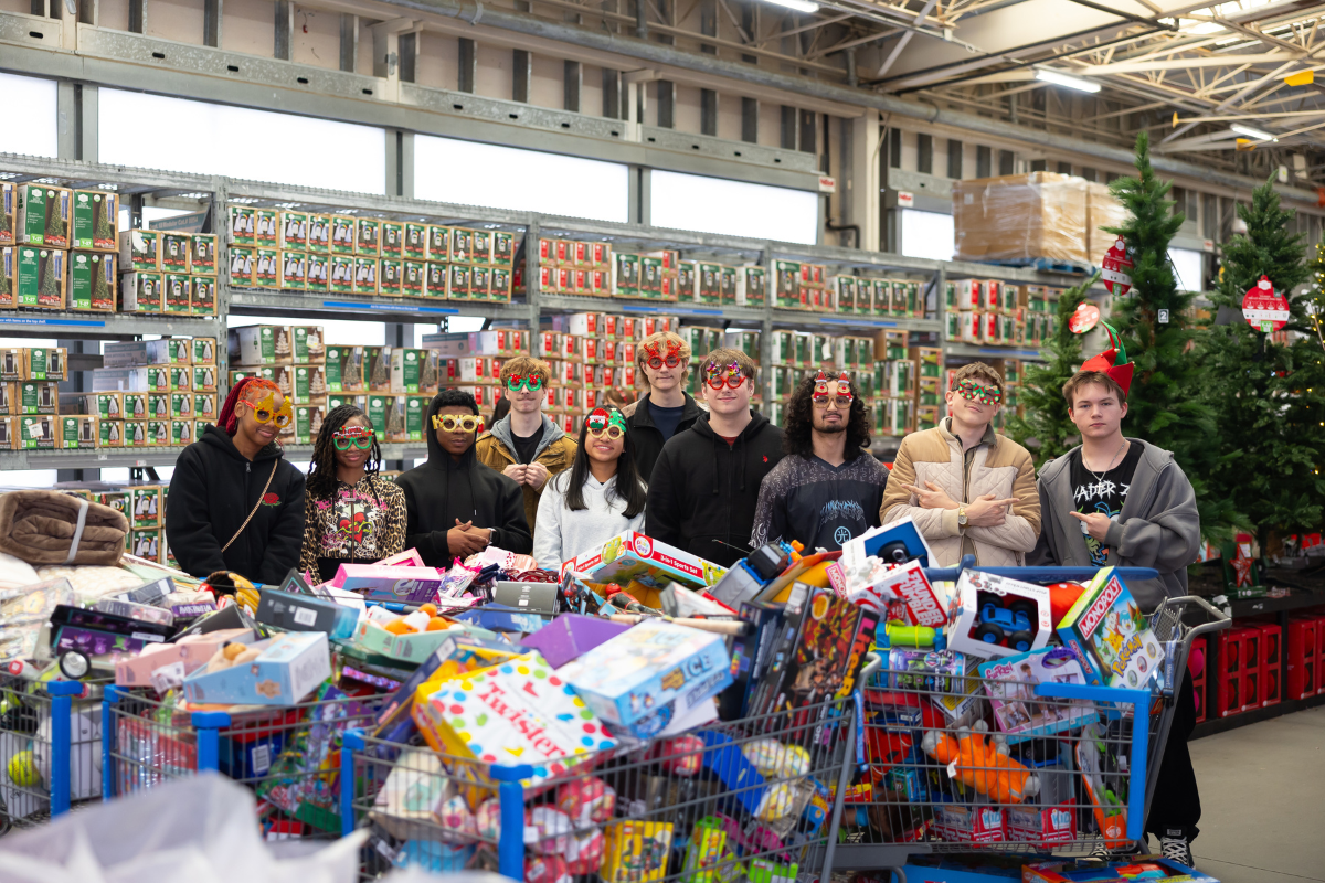 Volunteers shopping for Christmas gifts
