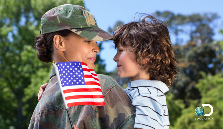 solider holding a child 