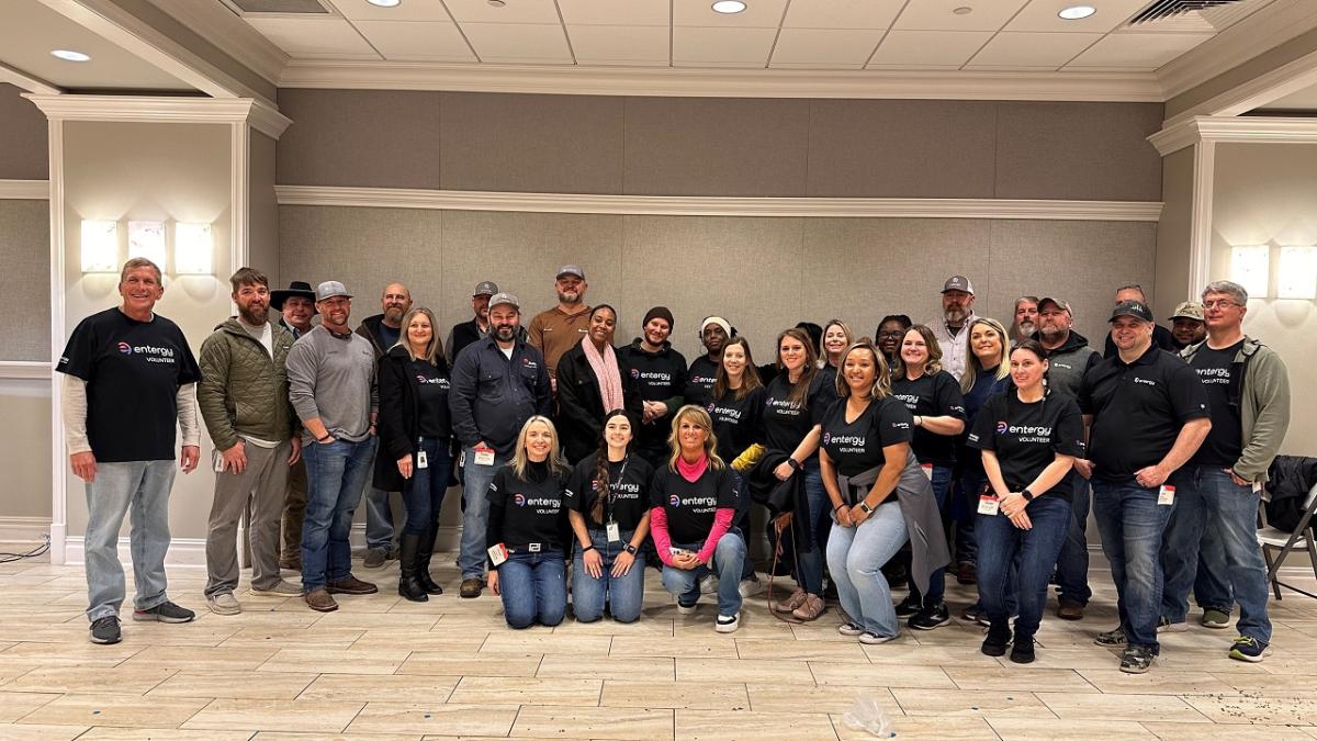 A group of volunteers posed