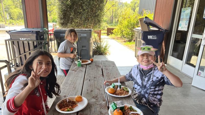 Students eating at a table