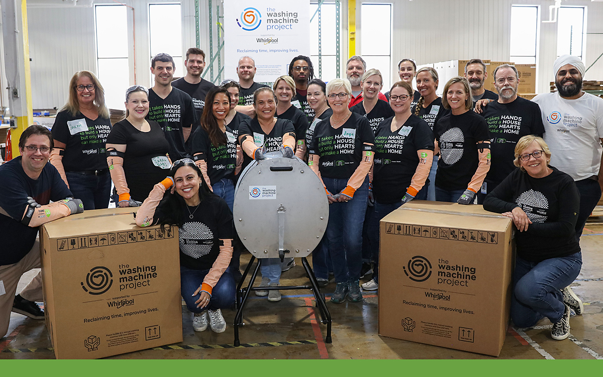 Group photo with a washing machine