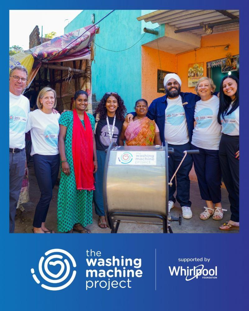 Group photo with donated machine