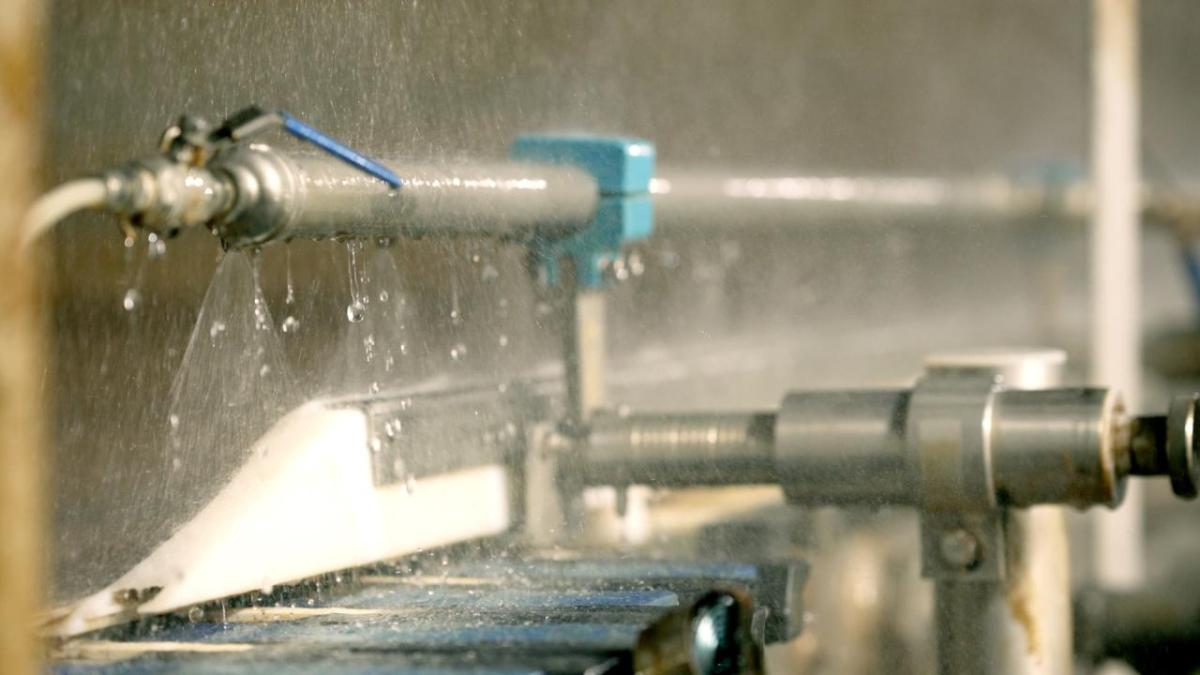 Water spraying out of a tap