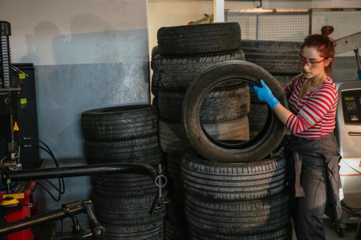 Person stacking tires