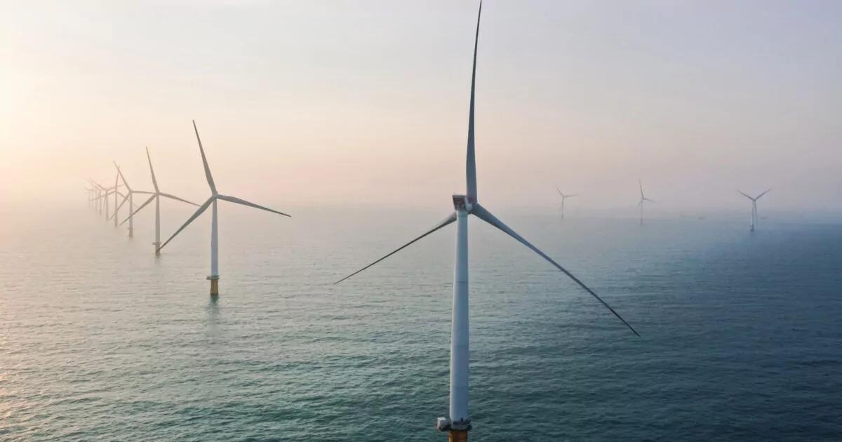 Offshore wind turbines in the fog.