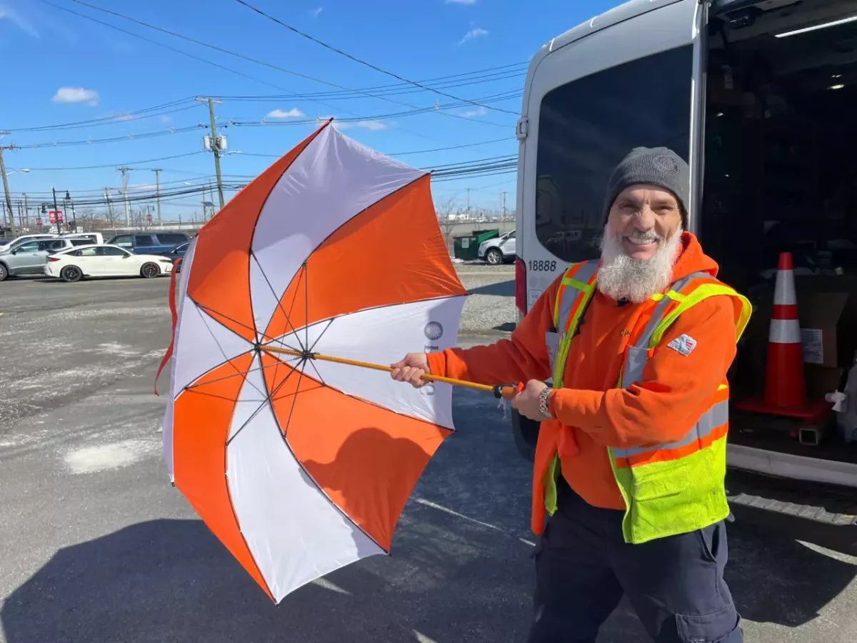 Paul Manzi with umbrella