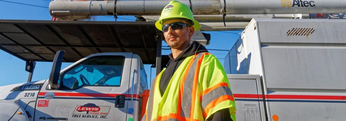 Joey Hunt in hard hat and yellow vest