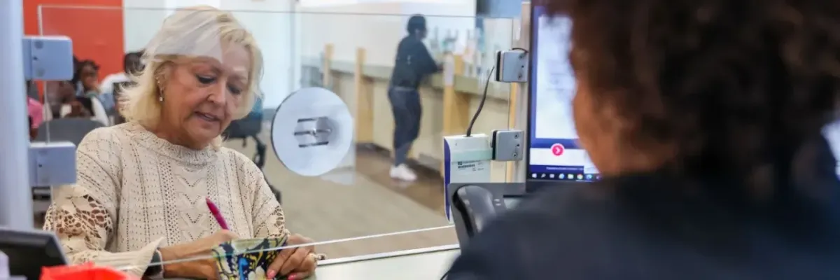 person at a teller
