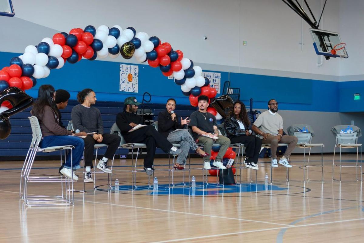 AEG leaders participate in a student career pathway panel at Compton High School sharing insights into careers across sports, music, and live entertainment.